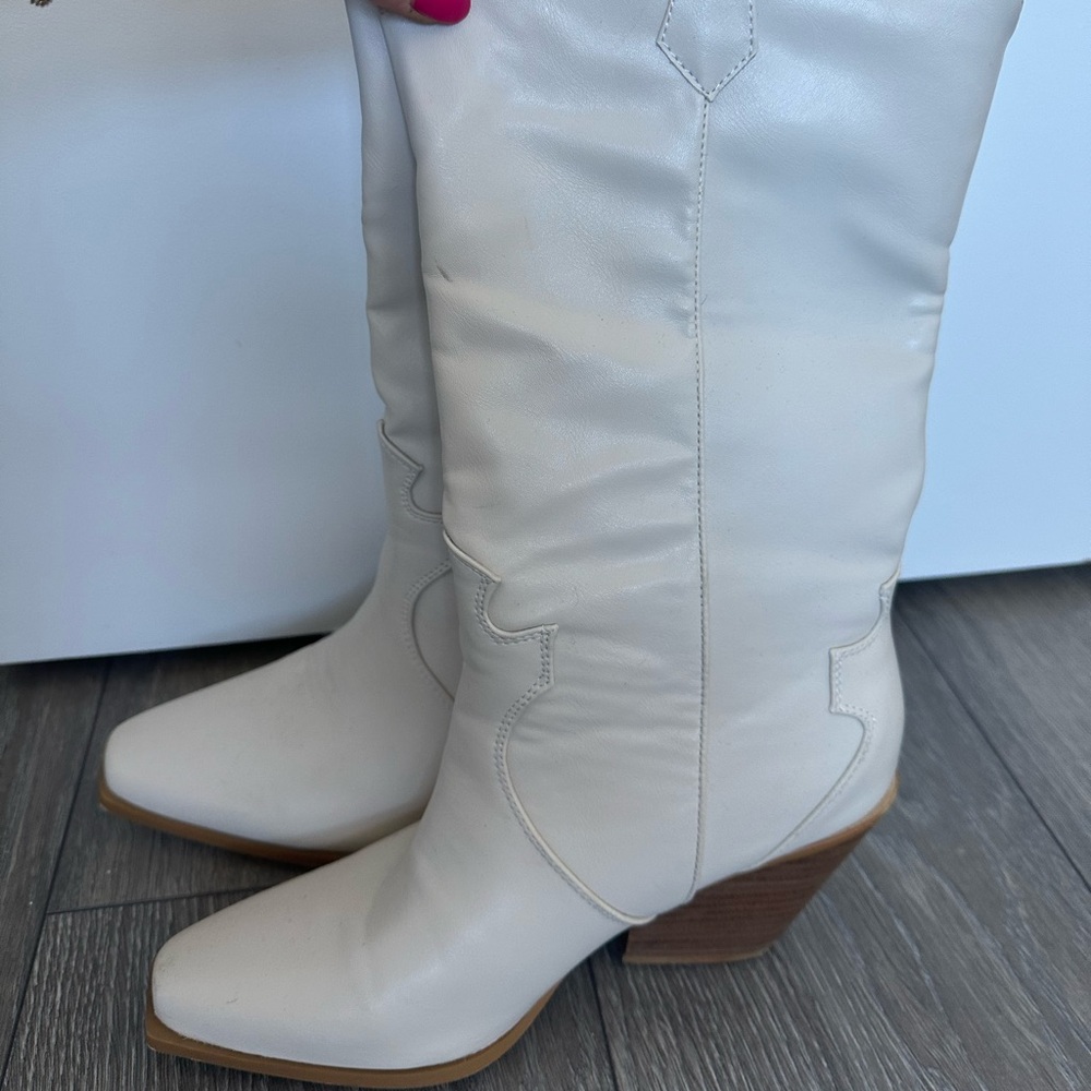 Cream Billini cowboy boots mid size.